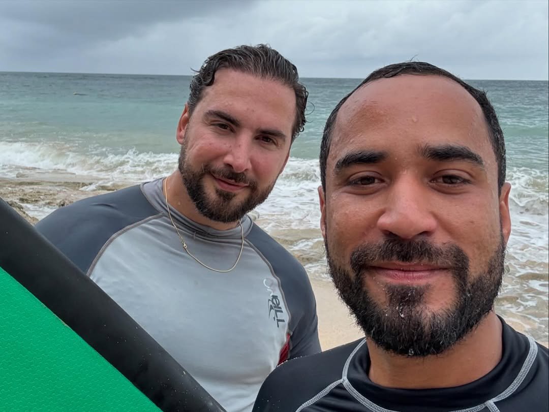 David & Marcos surfing